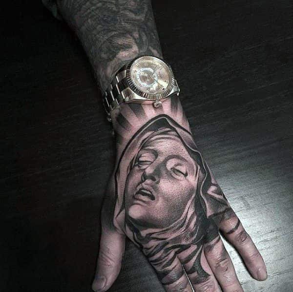 tatuagem de virgem maria na mão1