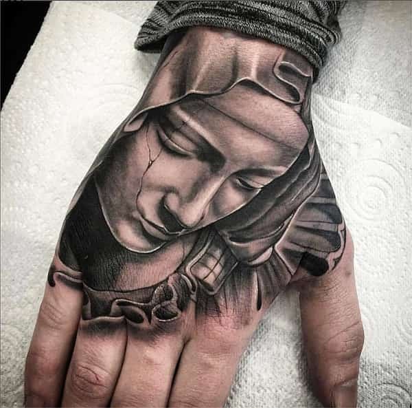 tatuagem de virgem maria na mão3